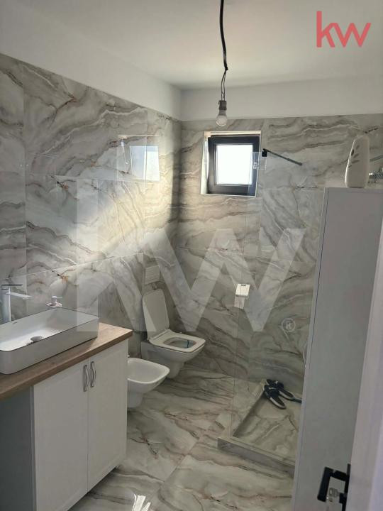  Casă practică și bine compartimentată, ideală pentru familie